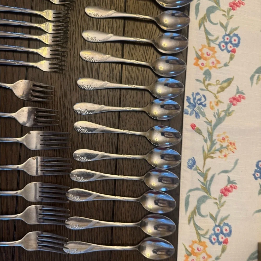 Stainless Steel Korea 45pc Flatware Set -Swirl on Handle w/ Leaf Design